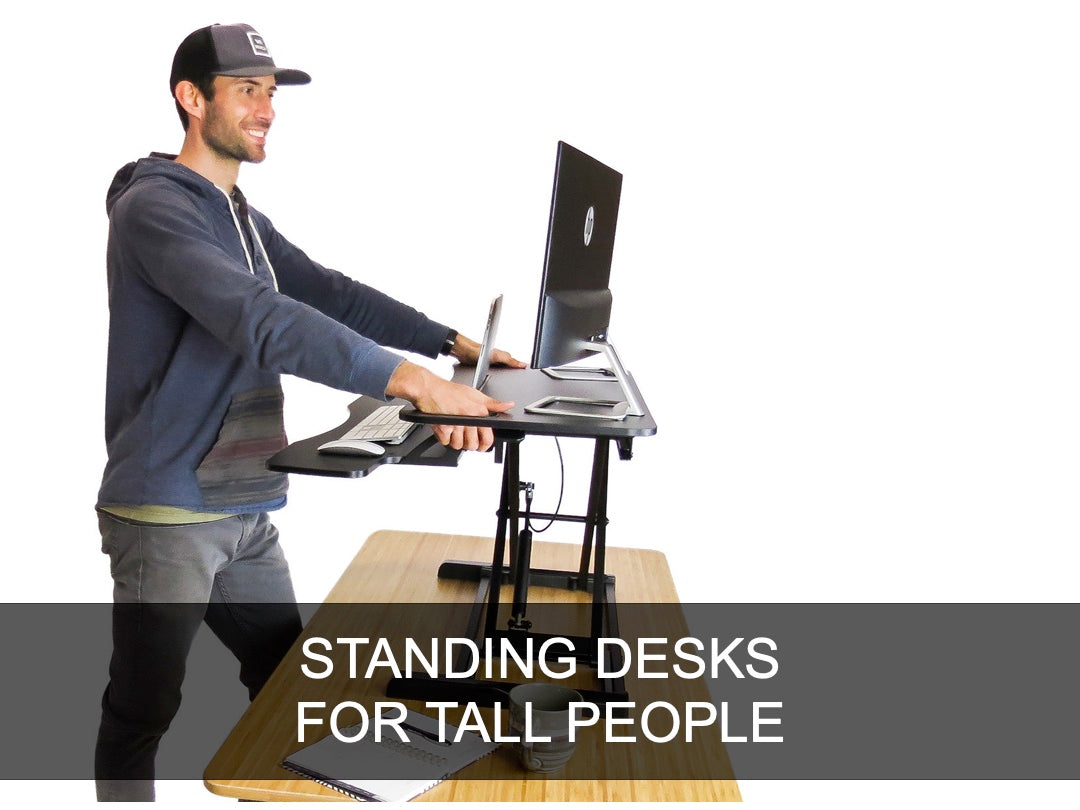 https://deskriser.com/cdn/shop/collections/Standing-desks-for-tall-people.jpg?v=1655362232